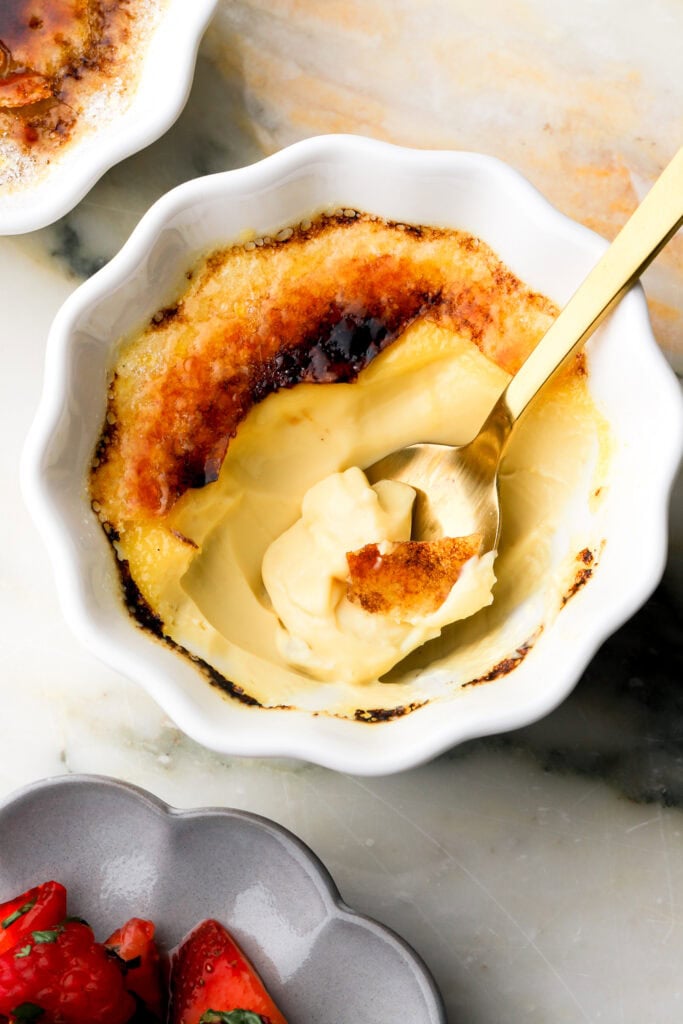 vanilla creme brulee with a bite taken out