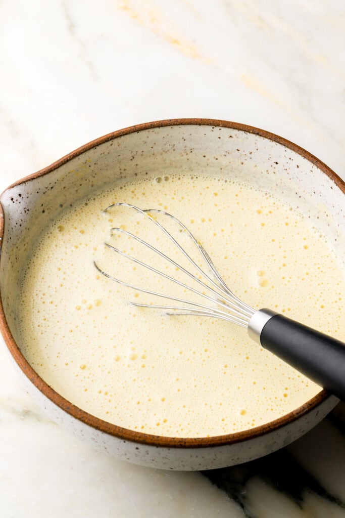 heavy cream mixed into egg yolk mixture