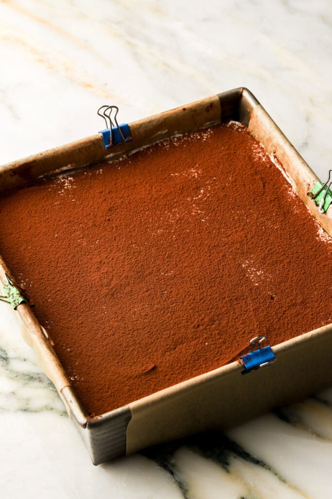 tiramisu brownies dusted with cocoa powder