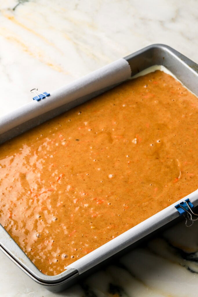 carrot cake batter in prepared pan