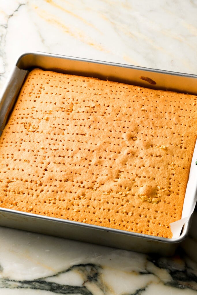 fork holes poked into the cake