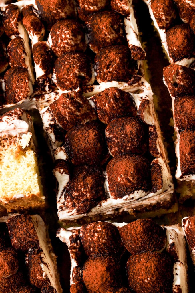 close up of tiramisu sheet cake sliced