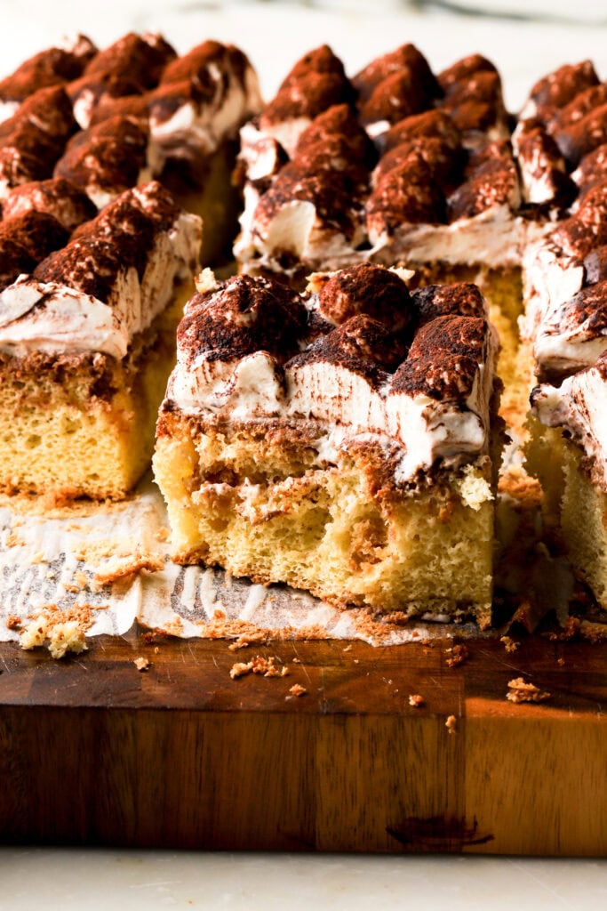 slice of tiramisu cake with a bite taken out