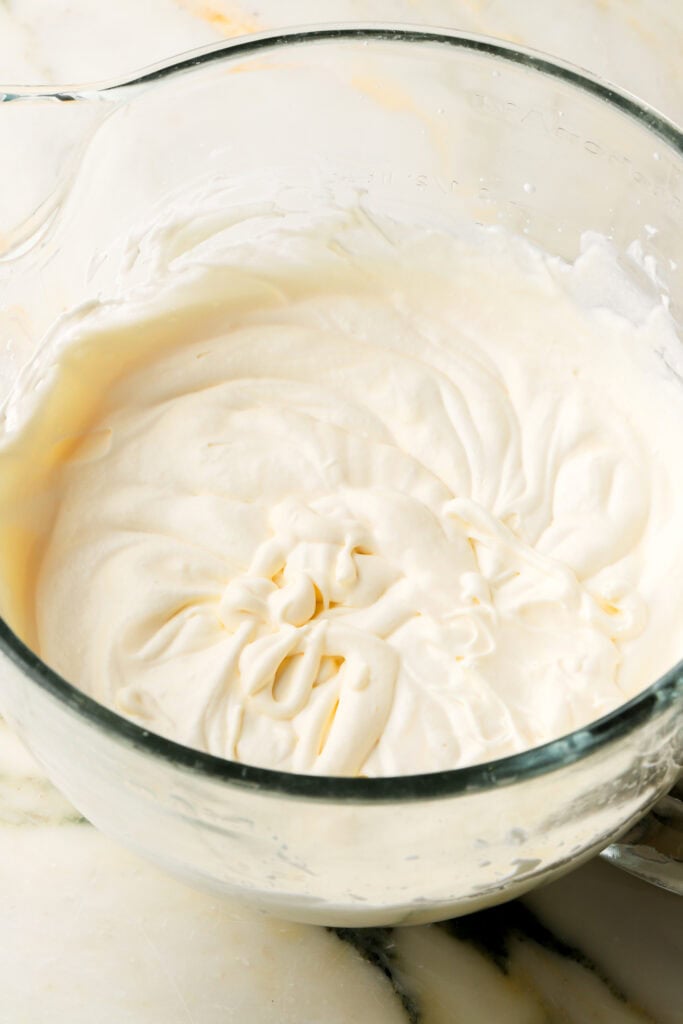 sweetened condensed milk, vanilla and salt mixed into whipped cream