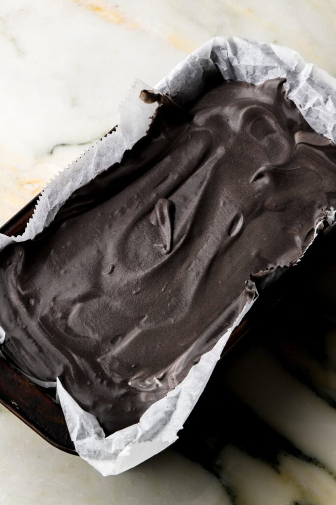 cooled espresso and cocoa mixture mixed into ice cream and spread in pan