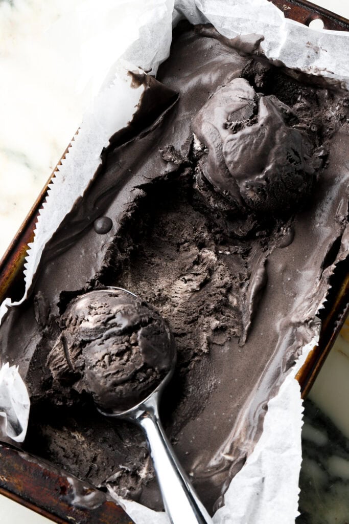Black cocoa ice cream with two scoops
