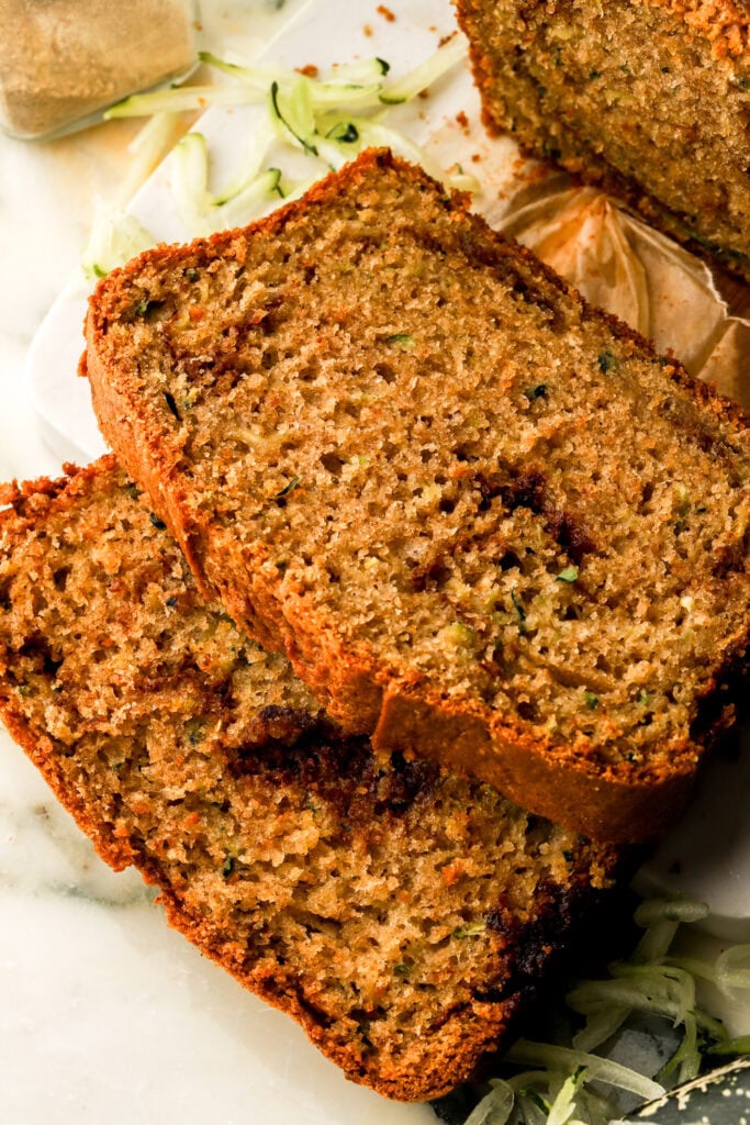 two slices of zucchini bread sliced