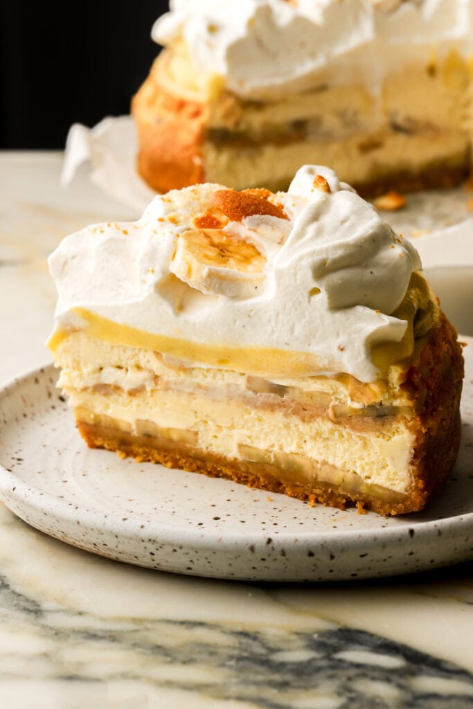 slice of banana pudding cheesecake showing all the layers