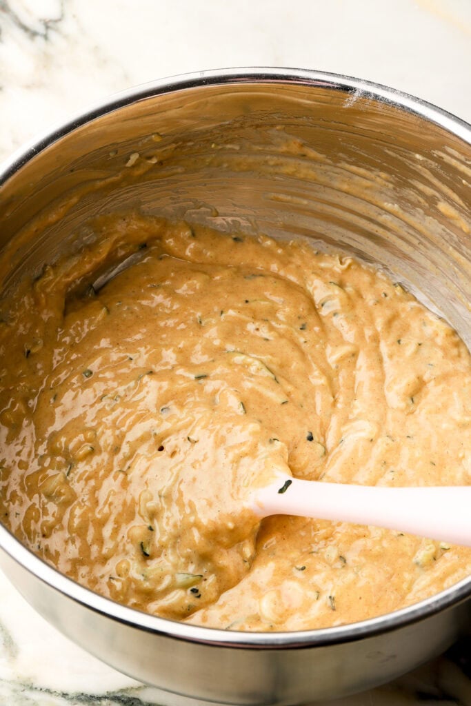 shredded zucchini folded into batter