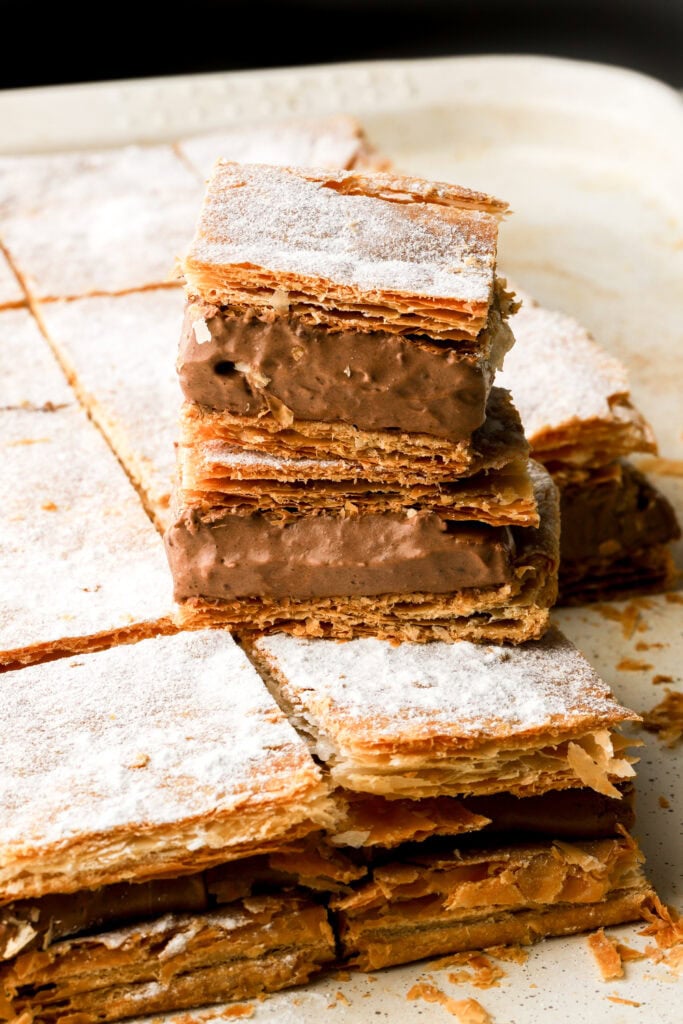 chocolate custard slices stacked on top of each other