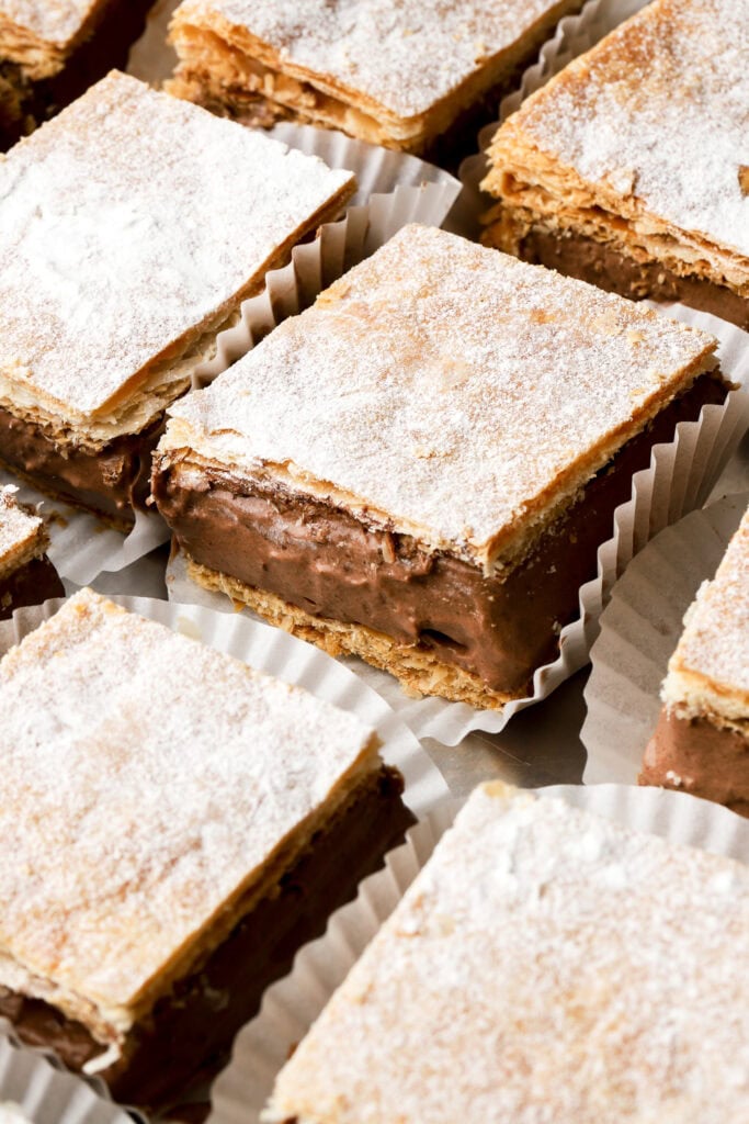 chocolate custard slices place in individual papers for serving