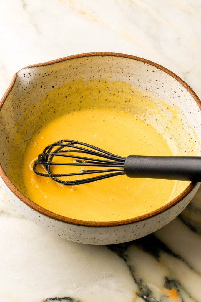 egg yolks whisked with sugar