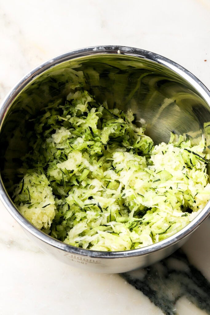 shredded zucchini in a brow
