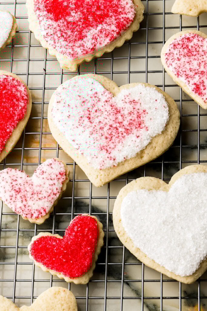 heart cookie with piping smashed into sprinkles