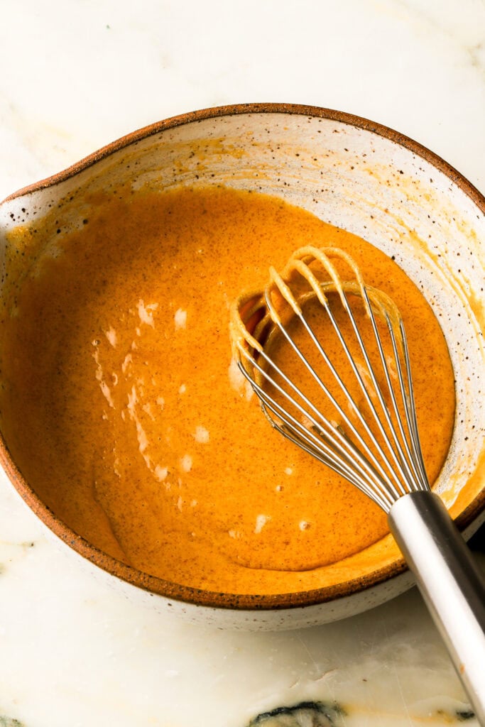 egg yolks whisked into butter and sugar