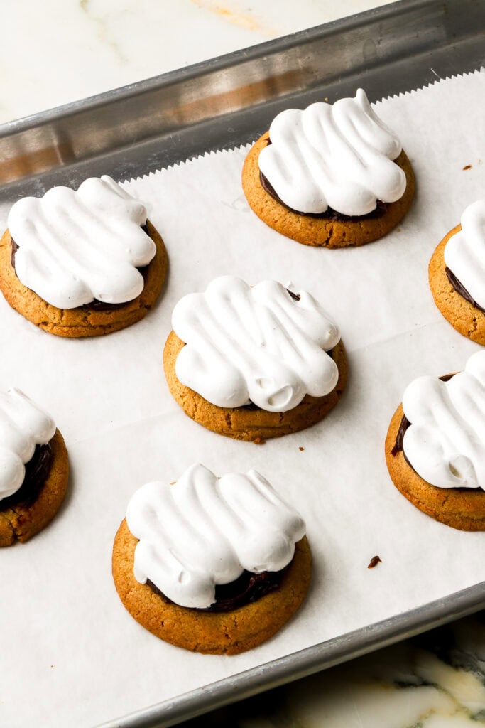 meringue piped onto cookies