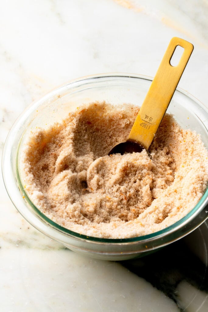 sugar mixed with orange zest, cinnamon and ginger for rolling