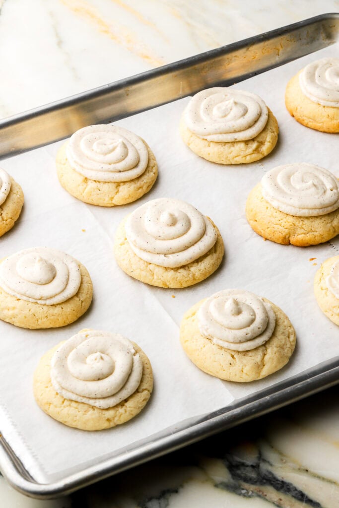 frosting piped onto cookies