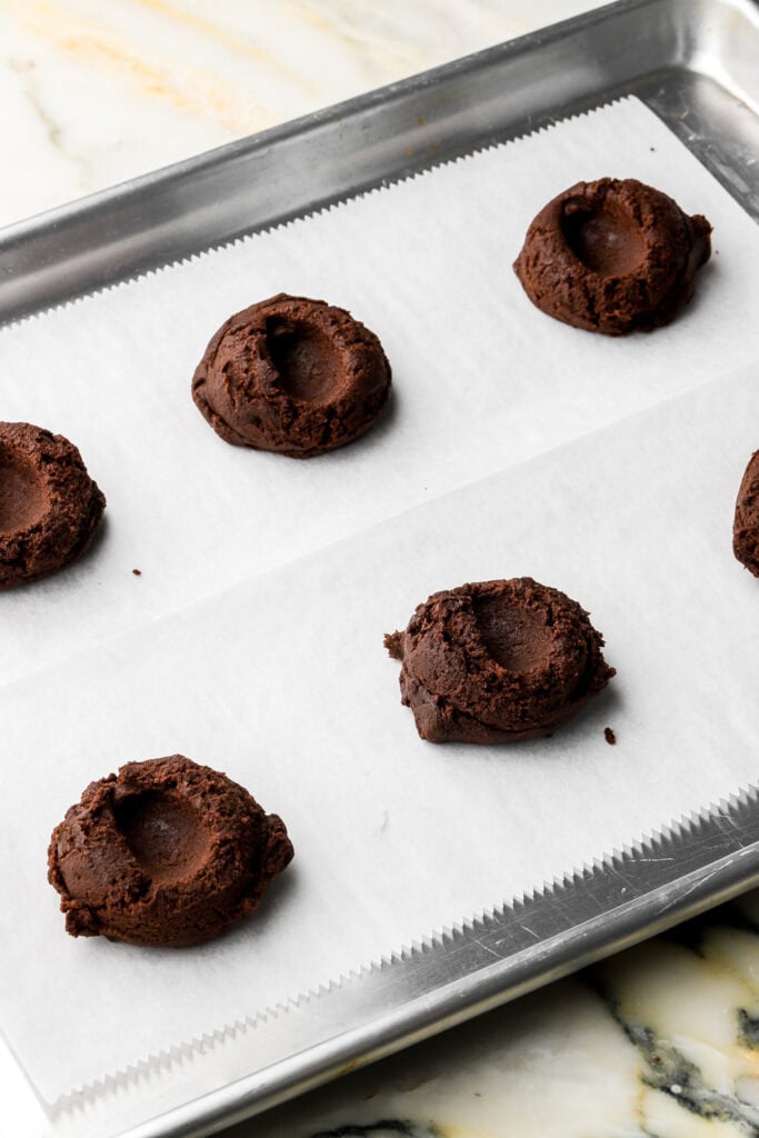 chocolate cookie dough with a well in the center