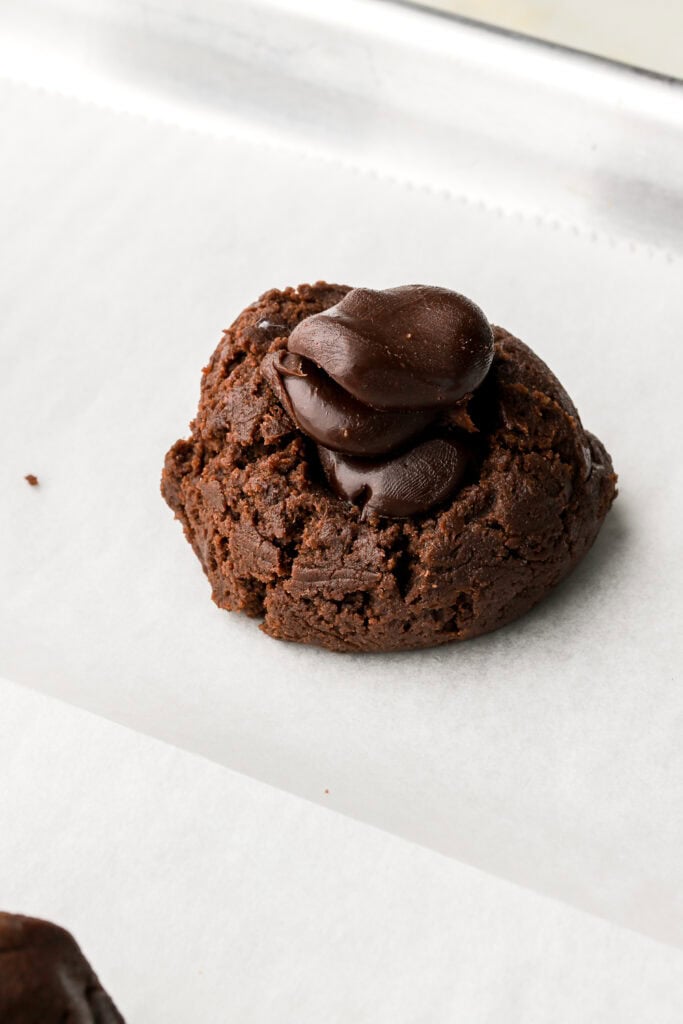 cookie dough with fudge discs in the well