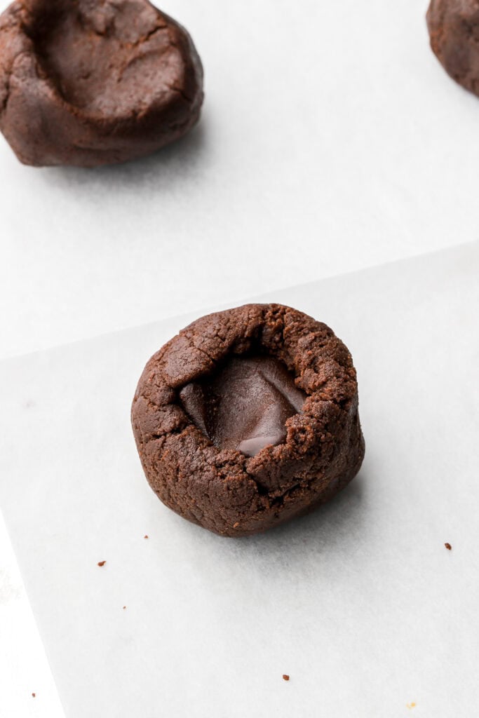 cookie dough halfway wrapped around the top