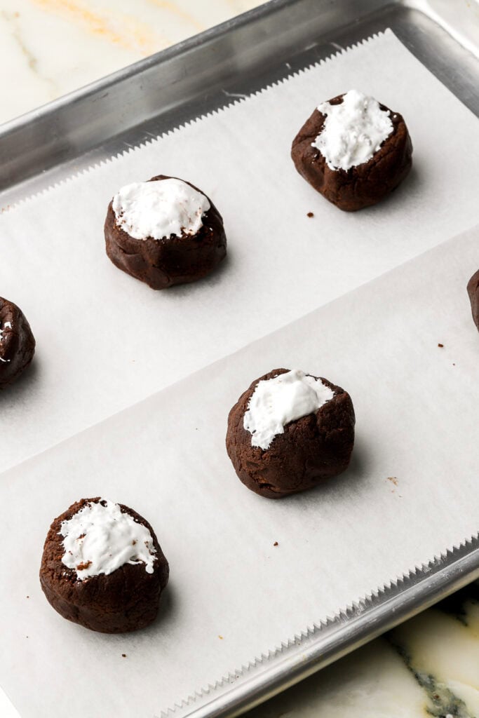 marshmallow fluff spread on top of the cookie