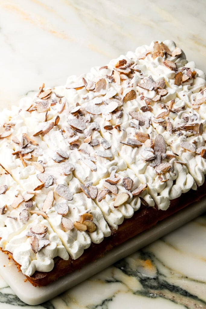 finished cake topped with powdered sugar