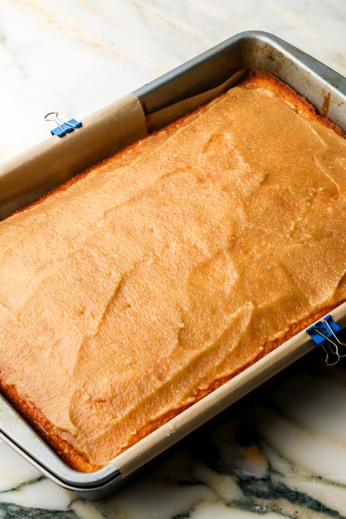almond filling spread on top of cake