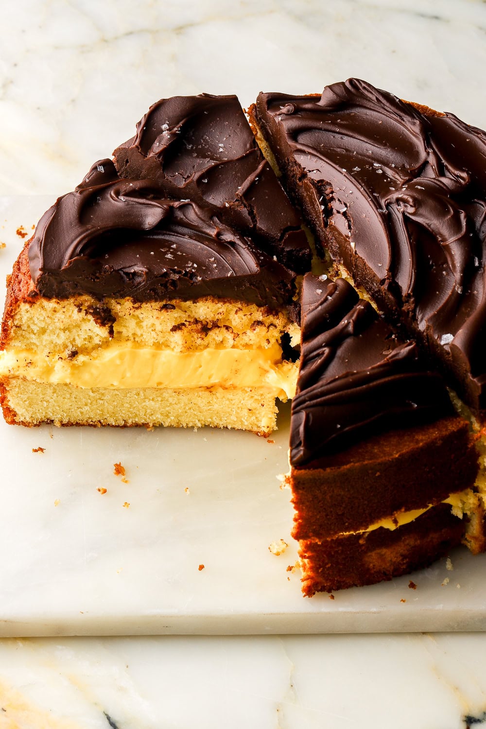 boston cream pie sliced and showing the inside
