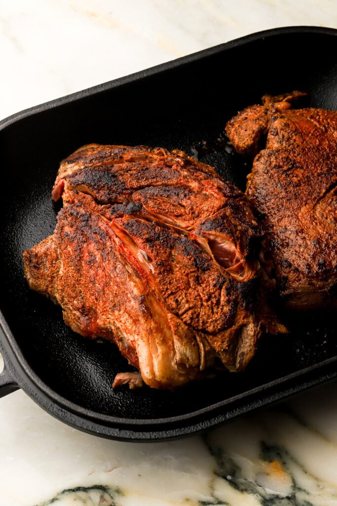 beef chuck roast seared in a cast iron