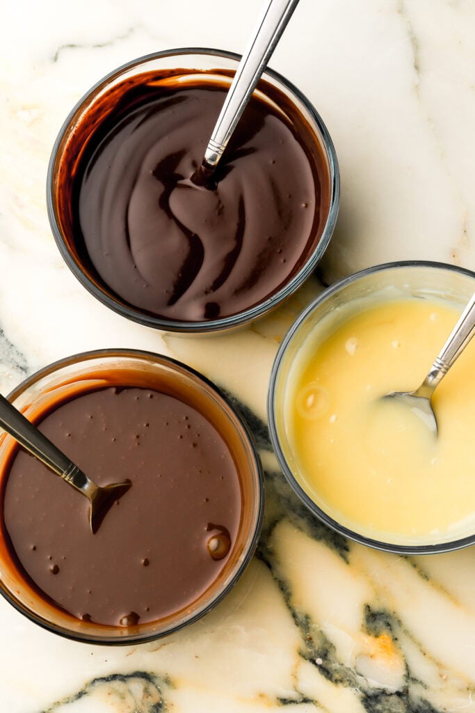white, milk and dark chocolate ganache melted and smooth