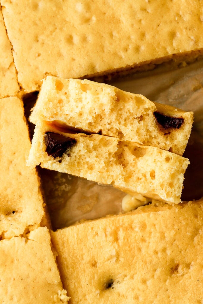 close up texture of the cottage cheese pancakes baked in a sheet pan with chocolate chips