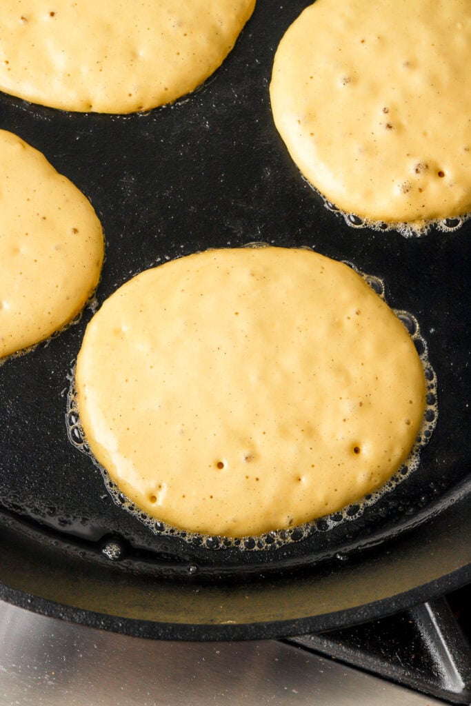 close up of pancake once you can see the bubbles rising