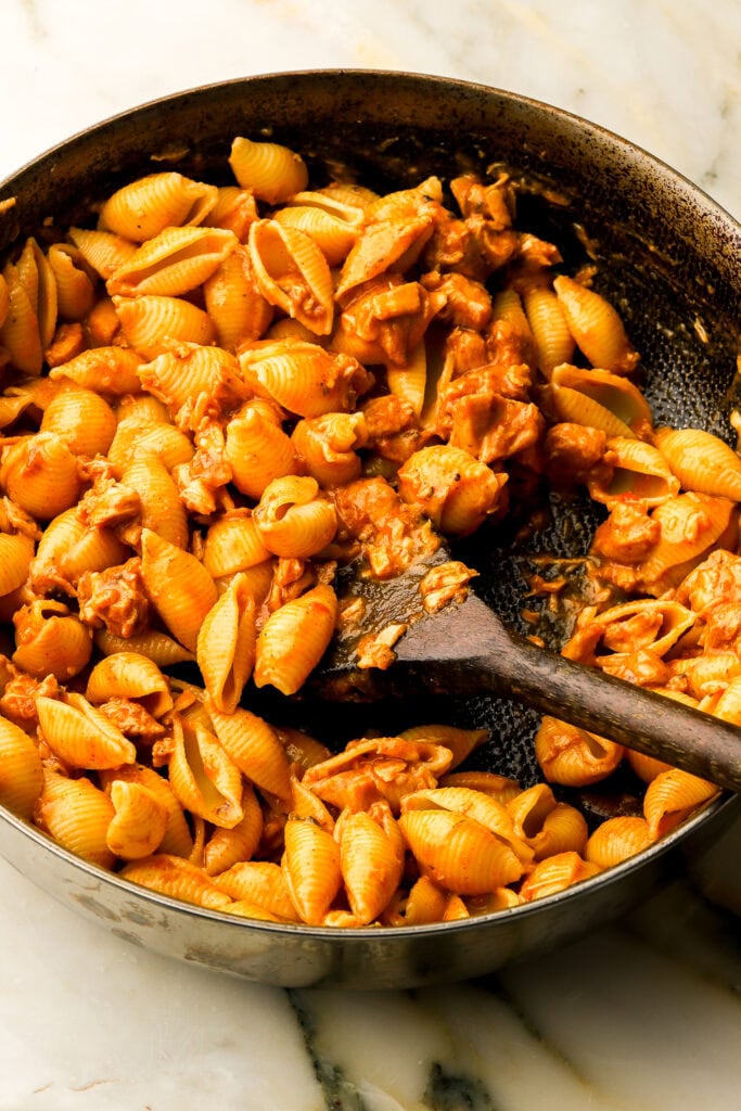 finished tocanita served with pasta