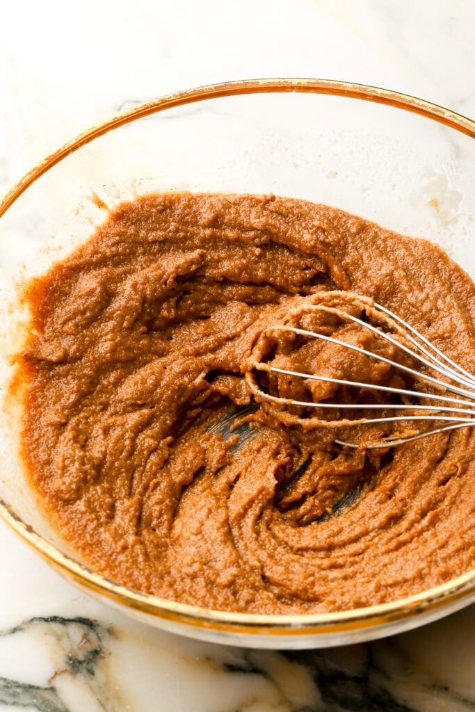 butter, sugar and cinnamon whisked together in a glass bowl