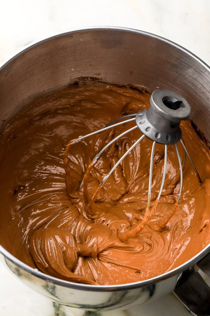 chocolate mixture beat into whipped butter 