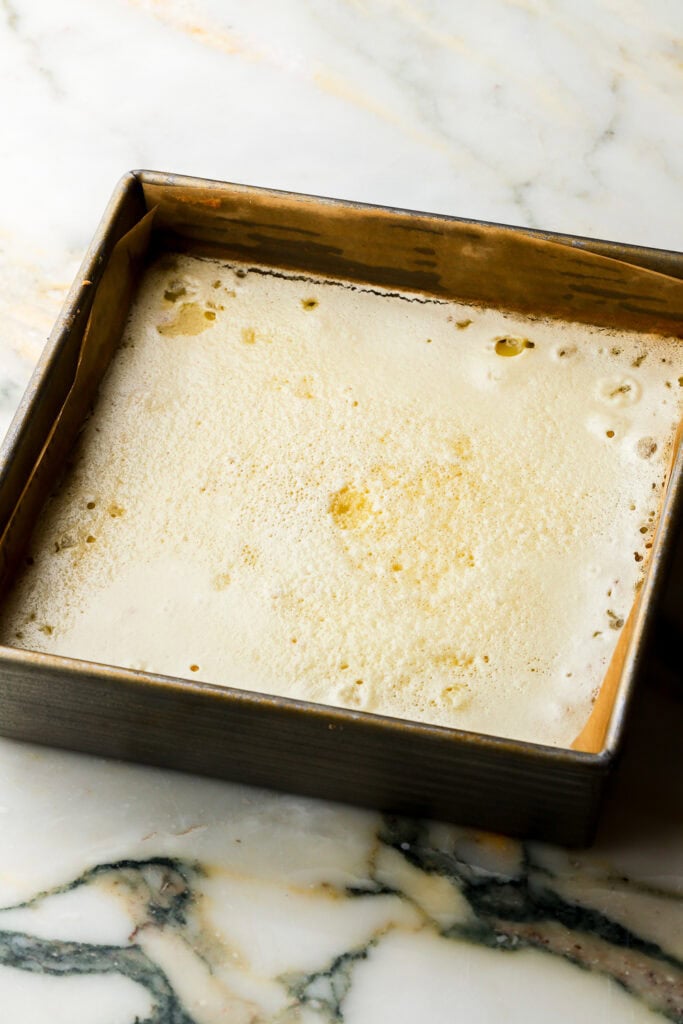lemon bars finished baking in metal pan