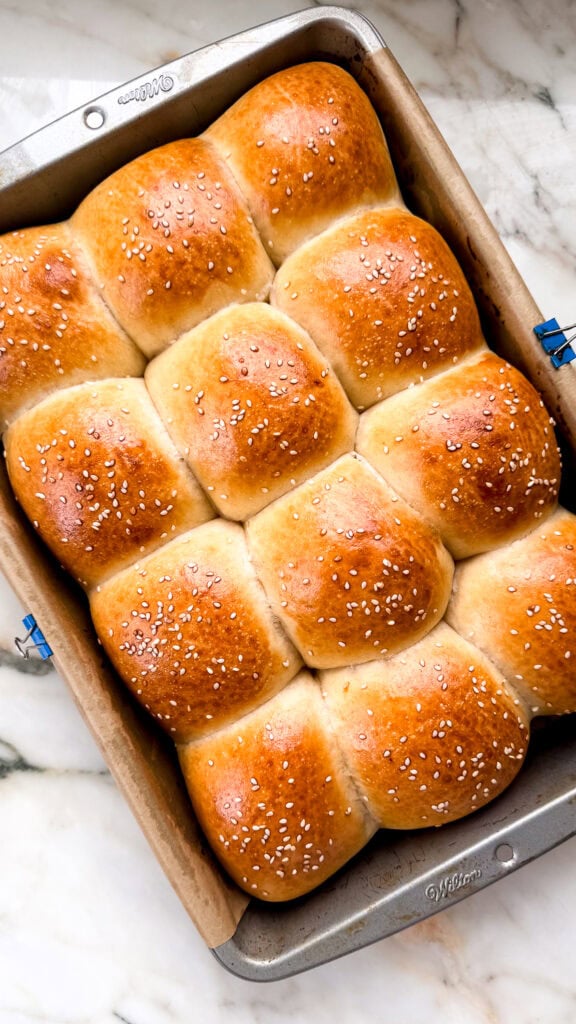 slider buns are finished baking and golden brown in baking pan