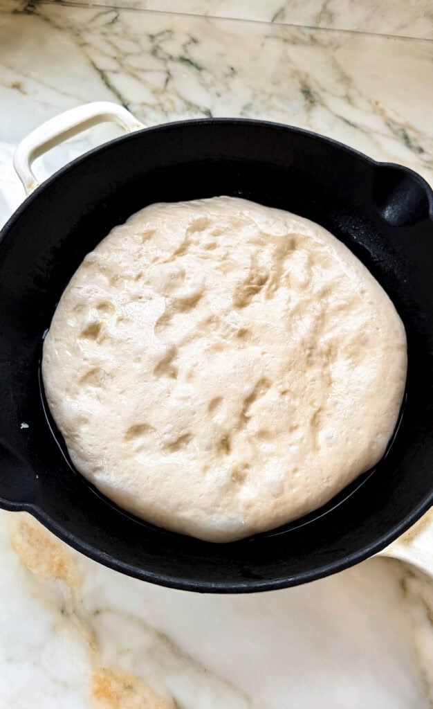 dough in prepared pan, lightly dimpled out