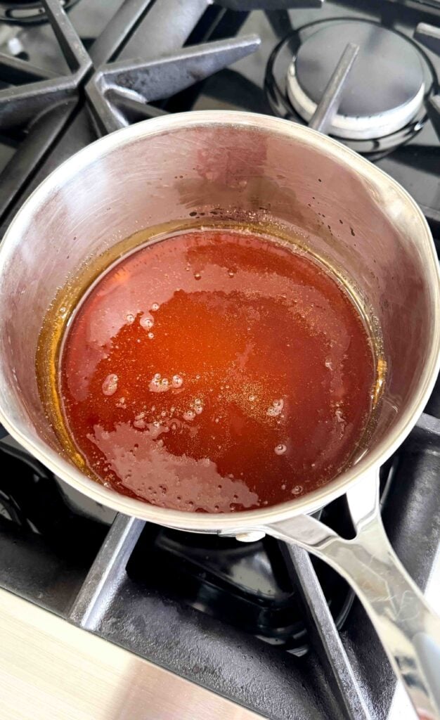 sugar melted and browned in the saucepan on the stove