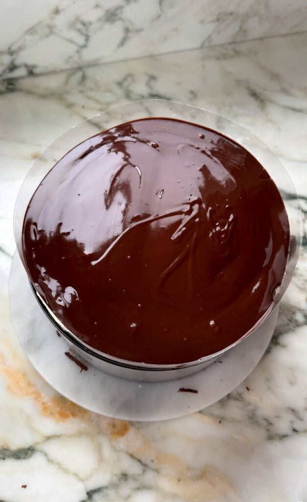 cake topped with chocolate ganache